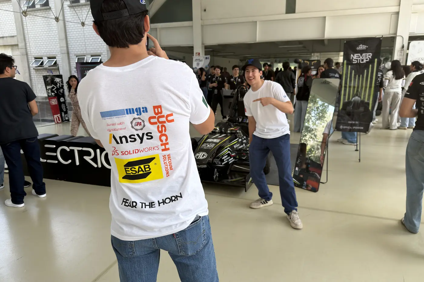 The back of a TEC Racing jersey carrying the partner logotypes at Formula SAE Mexico 2026