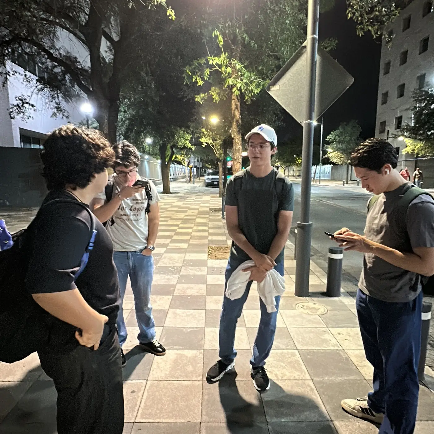 Team members on the street at the end of a competition day