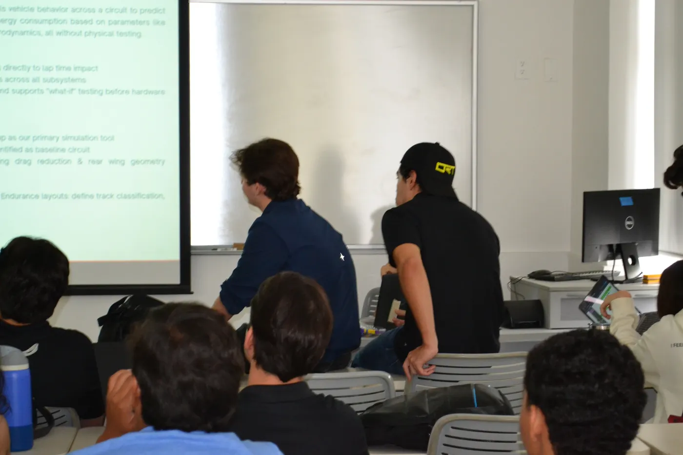 General team meeting with a technical presentation
