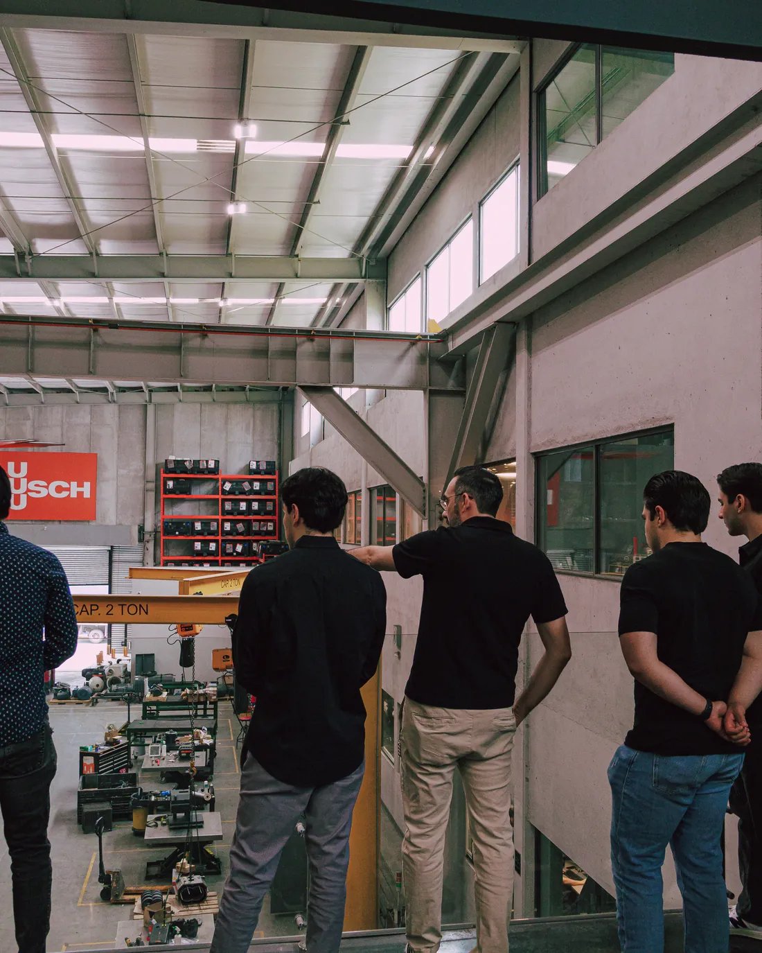 Tec Racing members during a visit to a partner manufacturing facility